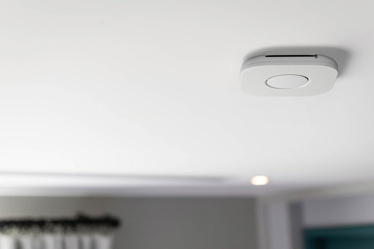 Vape Guardian sensor mounted on a white ceiling